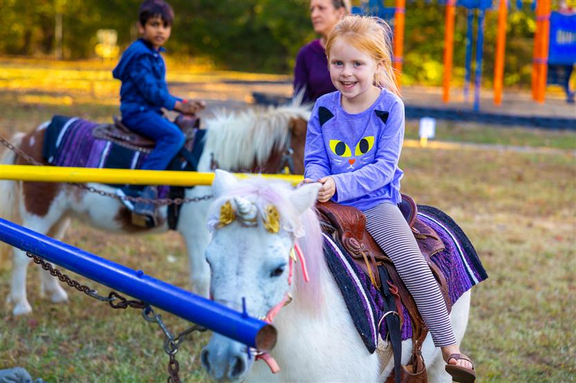 Students and families enjoy Romp n Stomp